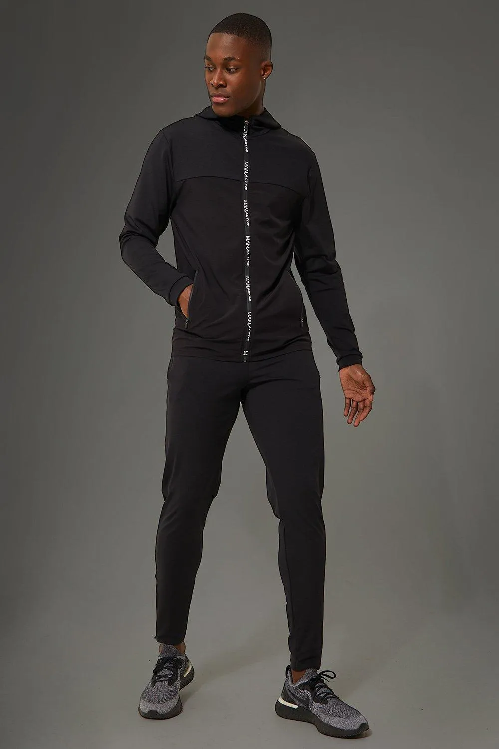 Active Gym Panelled Tracksuit With Zip Detail | boohooMAN UK