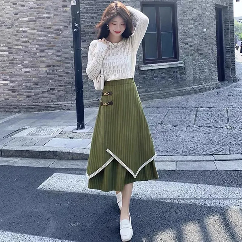 Autumn and winter striped skirt for women 2023 new style irregular high-waist slim umbrella skirt mid-length a-line hip-hugging 