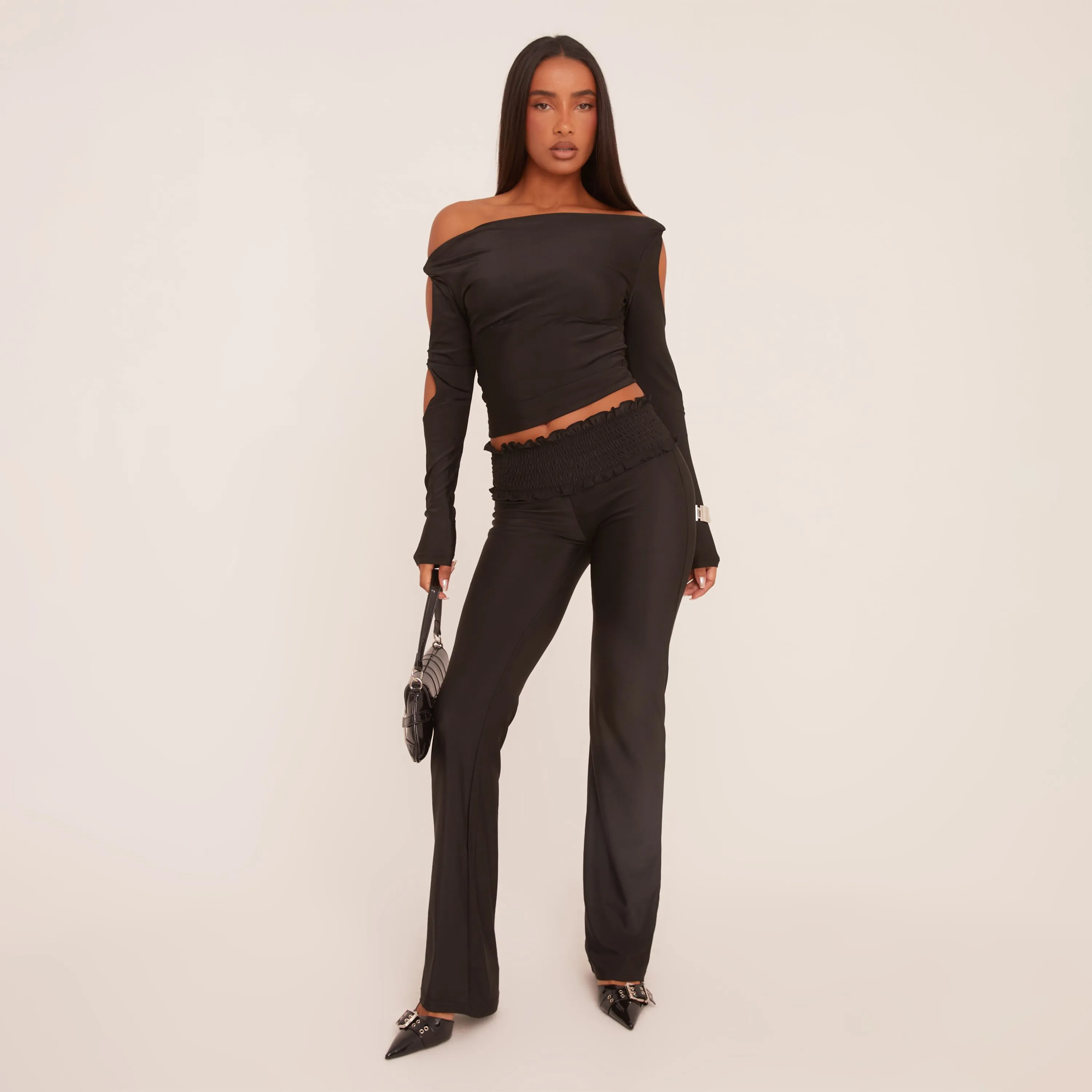 Bardot Twist Sleeve Detail Top And Shirred Waist Flared Trousers Co-Ord Set In Black Slinky